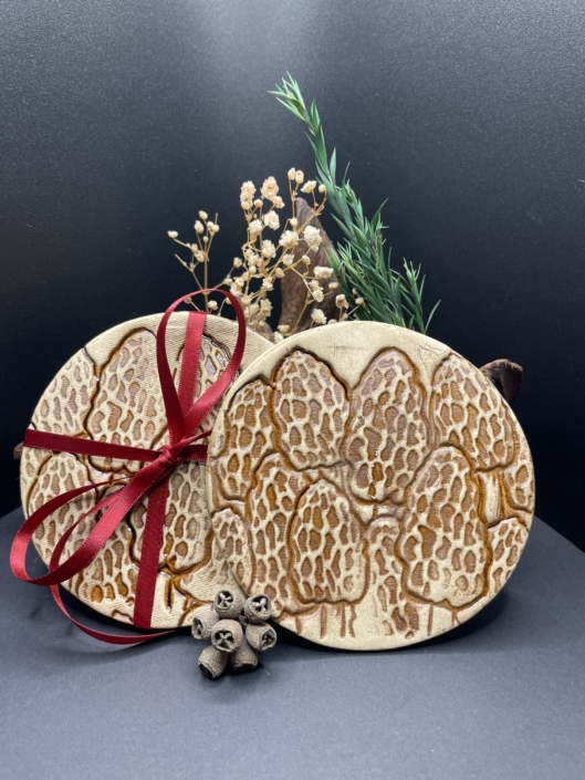 Beautiful handmade ceramic morel mushroom coasters by potter Kim Koehler