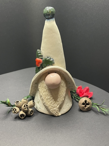 The Holly Christmas Gnome is spreading the cheer of the season! Ceramic pottery by Kim Koehler