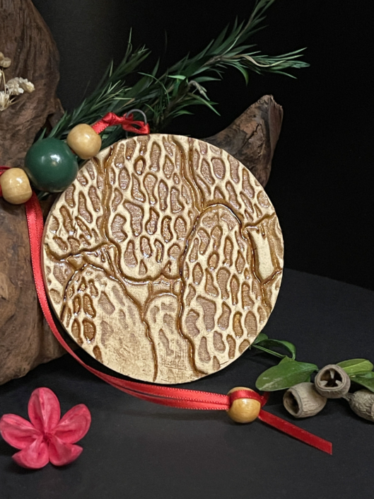 Ceramic Morel Mushroom Christmas ornament made by artist Kim Koehler